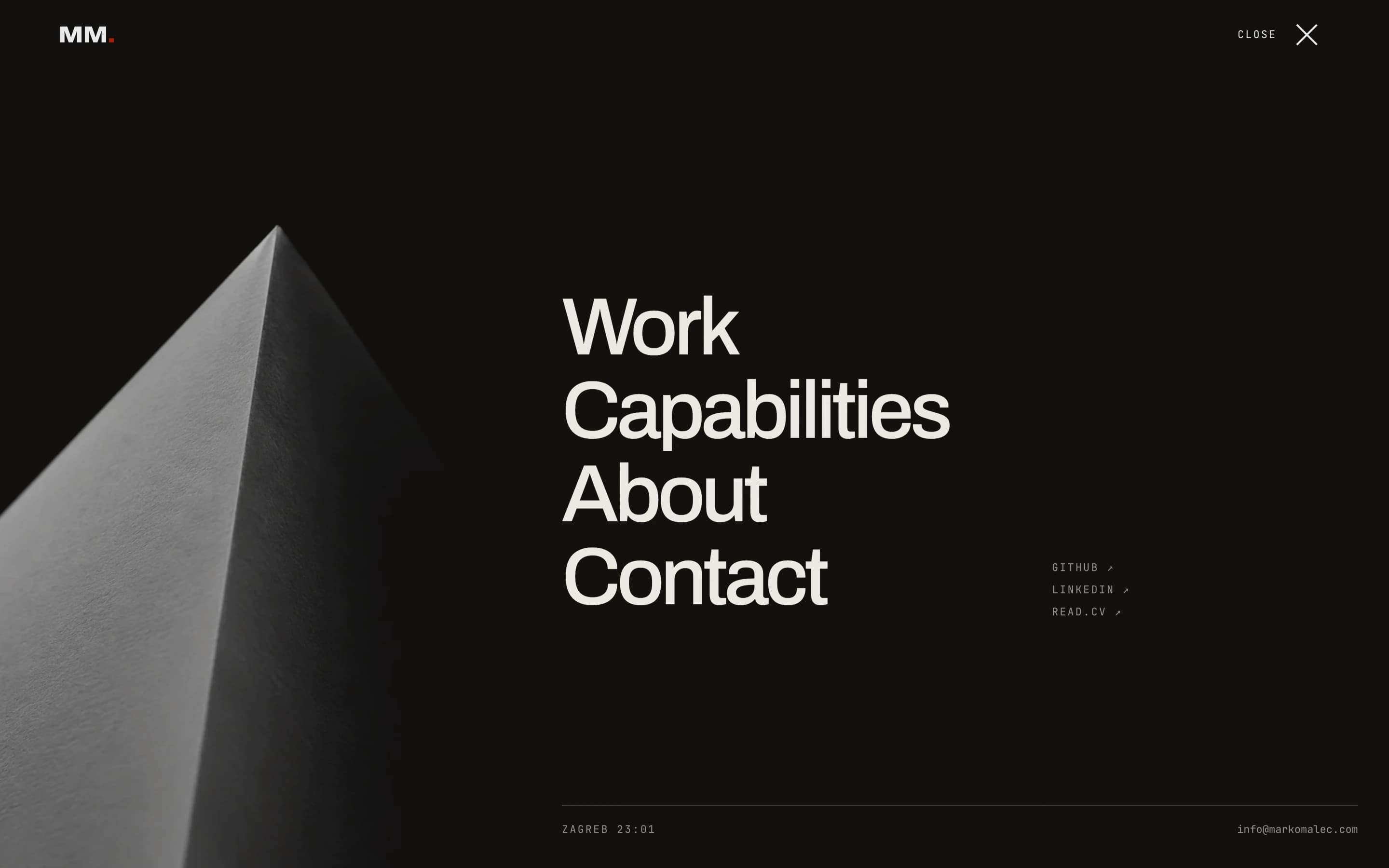 Full-screen portfolio menu with a folded paper texture and large navigation links